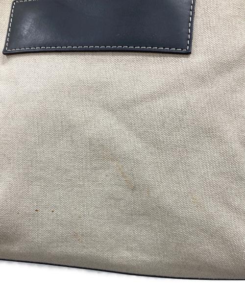 IACUCCI（イアクッチ）IACUCCI (イアクッチ) キャンバストートバッグ ベージュ・ブラックの古着・服飾アイテム