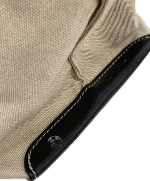 IACUCCI（イアクッチ）IACUCCI (イアクッチ) キャンバストートバッグ ベージュ・ブラックの古着・服飾アイテム