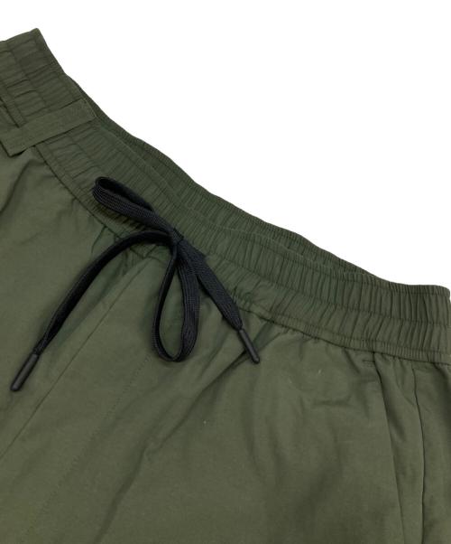 WHITE MOUNTAINEERING（ホワイトマウンテ二アニング）WHITE MOUNTAINEERING (ホワイトマウンテ二アニング) UMBRO (アンブロ) EASY CARGO PANTS グリーンの古着・服飾アイテム