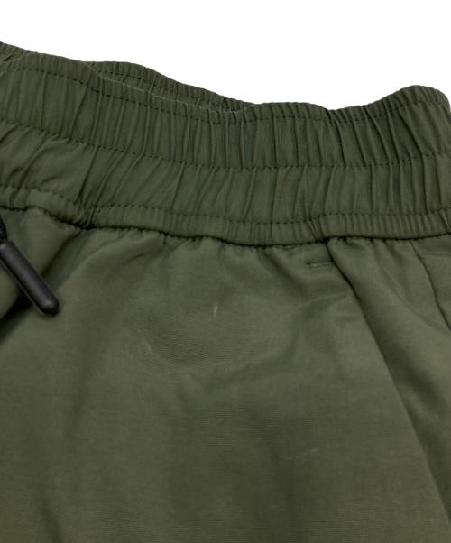 WHITE MOUNTAINEERING（ホワイトマウンテ二アニング）WHITE MOUNTAINEERING (ホワイトマウンテ二アニング) UMBRO (アンブロ) EASY CARGO PANTS グリーンの古着・服飾アイテム