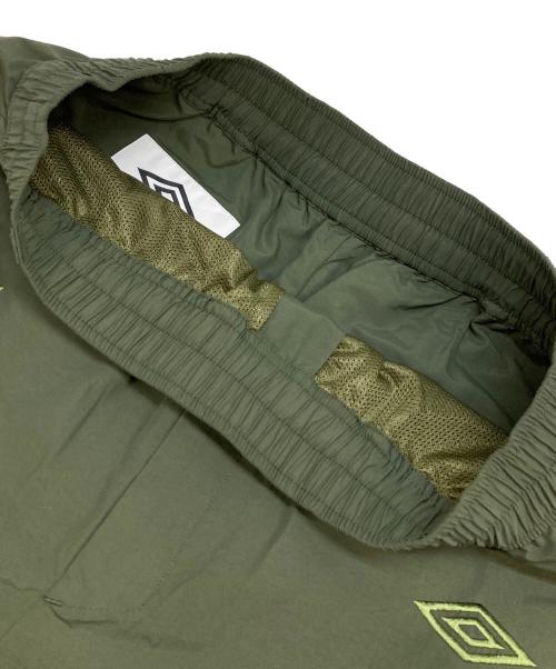 WHITE MOUNTAINEERING（ホワイトマウンテ二アニング）WHITE MOUNTAINEERING (ホワイトマウンテ二アニング) UMBRO (アンブロ) EASY CARGO PANTS グリーンの古着・服飾アイテム
