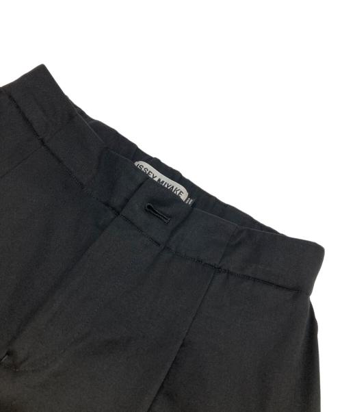 ISSEY MIYAKE（イッセイミヤケ）ISSEY MIYAKE (イッセイミヤケ) ストレッチパンツ ブラック サイズ:1の古着・服飾アイテム