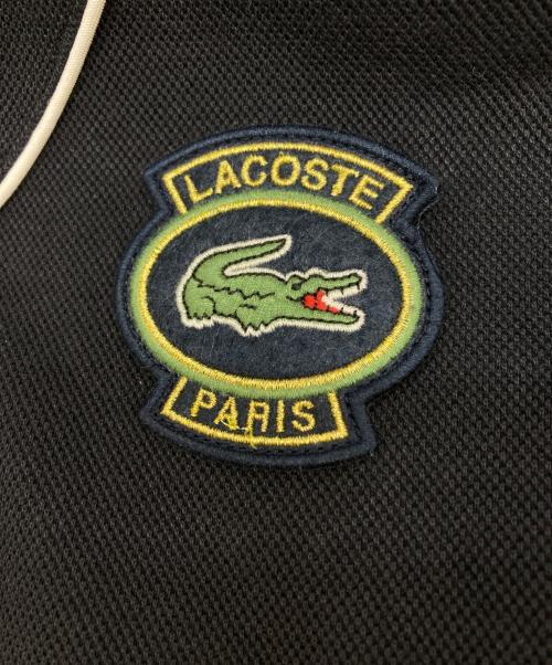 LACOSTE（ラコステ）LACOSTE (ラコステ) ダブルフェイス鹿の子ハーフジップジャケット ネイビー サイズ:US Mの古着・服飾アイテム