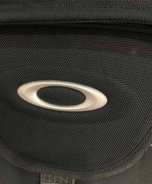OAKLEY（オークリー）OAKLEY (オークリー) AP タクティカル ローラーバッグ クリップ　アーカイブ　 ブラックの古着・服飾アイテム