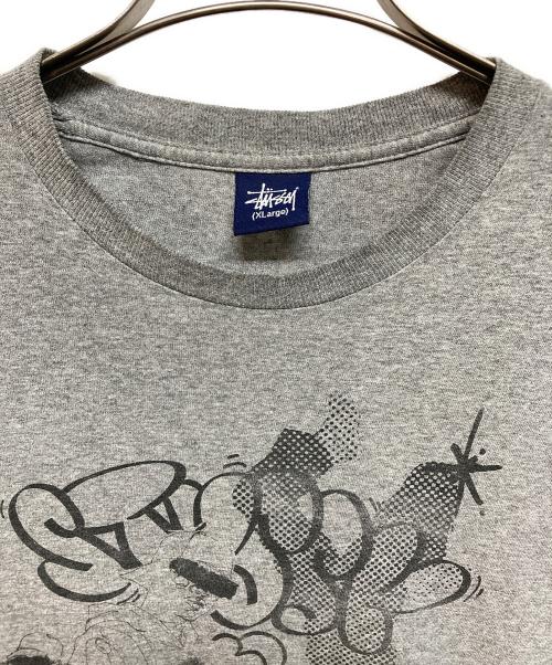 stussy（ステューシー）stussy (ステューシー) プリントTシャツ グレー サイズ:XLの古着・服飾アイテム
