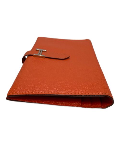 HERMES（エルメス）HERMES (エルメス) ベアン長財布 オレンジの古着・服飾アイテム
