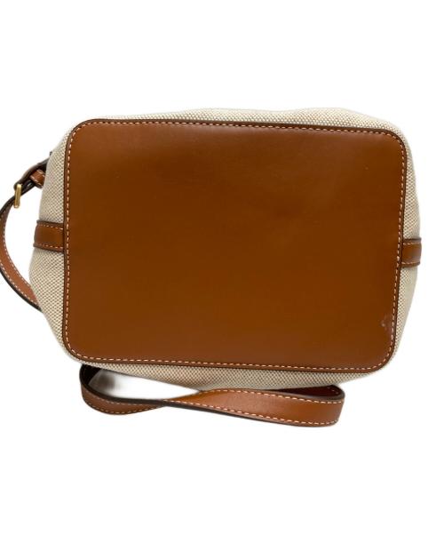 TORY BURCH（トリーバーチ）TORY BURCH (トリーバーチ) ブレイクキャンバスバケットバッグ アイボリーの古着・服飾アイテム