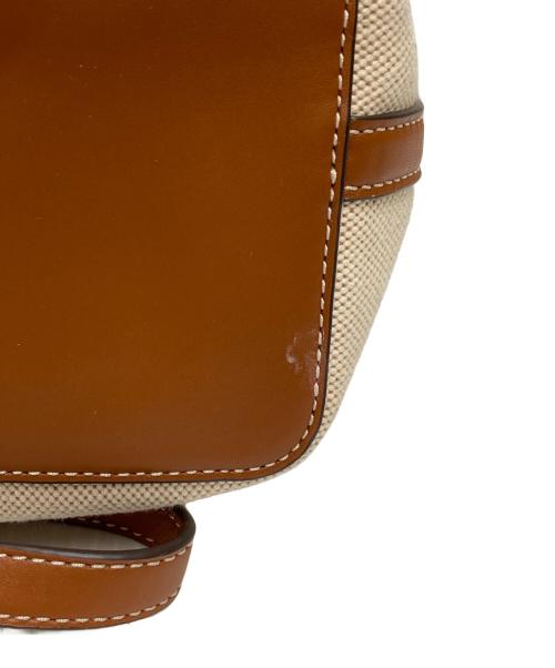 TORY BURCH（トリーバーチ）TORY BURCH (トリーバーチ) ブレイクキャンバスバケットバッグ アイボリーの古着・服飾アイテム