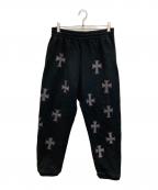 Unknown londonアンノウンロンドン）の古着「Cross Rhinestone Joggers」｜ブラック