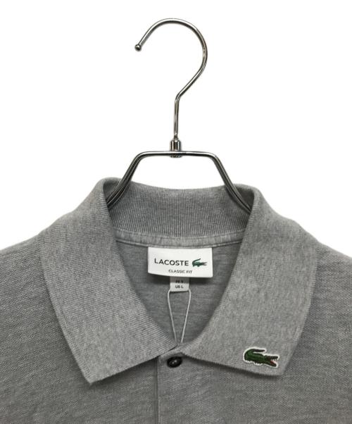 LACOSTE（ラコステ）LACOSTE (ラコステ) ポロシャツ グレー サイズ:L 未使用品の古着・服飾アイテム
