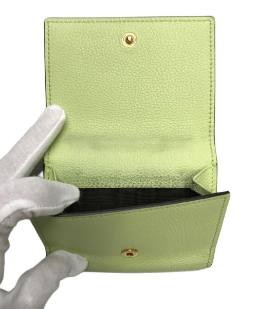 GUCCI（グッチ）GUCCI (グッチ) エンボスロゴミニウォレットコンパクト ライトグリーンの古着・服飾アイテム