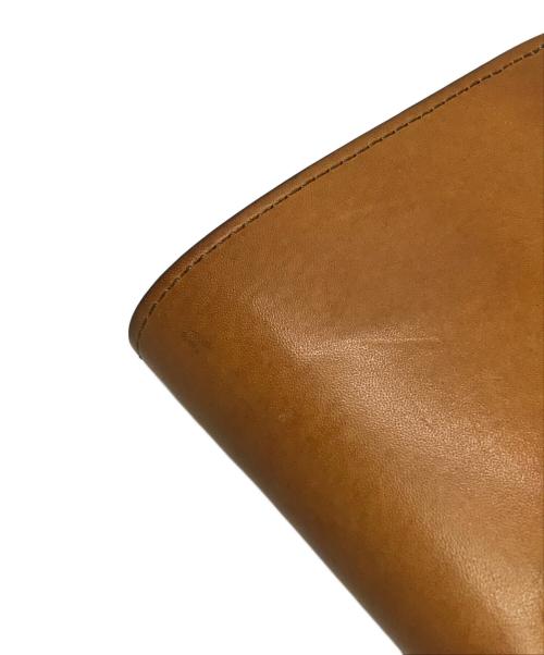 WILDSWANS（ワイルドスワンズ）WILDSWANS (ワイルドスワンズ) 小銭入れ付2つ折り財布GROUNDER ブラウンの古着・服飾アイテム