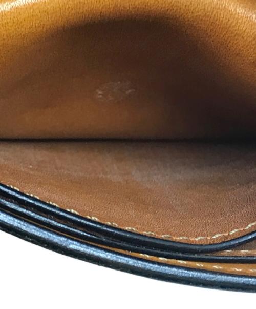 WILDSWANS（ワイルドスワンズ）WILDSWANS (ワイルドスワンズ) 小銭入れ付2つ折り財布GROUNDER ブラウンの古着・服飾アイテム