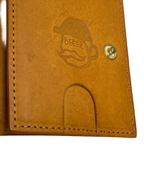 BEER BELLY（ビアベリー）BEER BELLY (ビアベリー) HATCHBACK SLIMコンパクト財布 ブラウンの古着・服飾アイテム