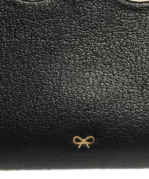 ANYA HINDMARCH（アニヤ・ハインドマーチ）ANYA HINDMARCH (アニヤ・ハインドマーチ) Large Zip Round Wallet Eyes in Capra ブラックの古着・服飾アイテム