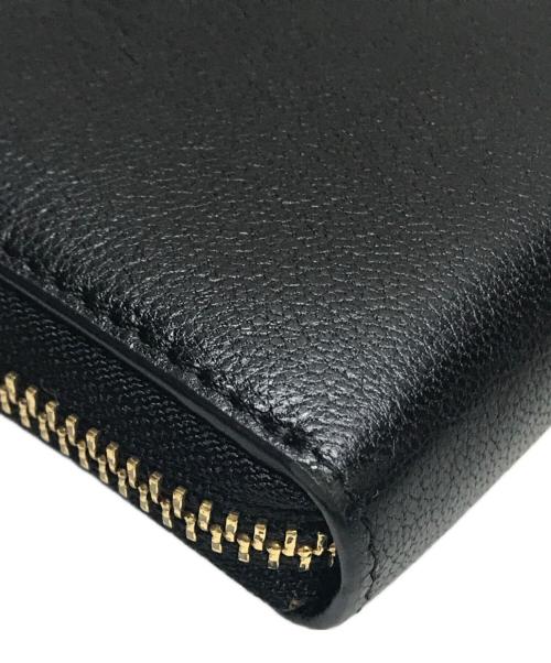 ANYA HINDMARCH（アニヤ・ハインドマーチ）ANYA HINDMARCH (アニヤ・ハインドマーチ) Large Zip Round Wallet Eyes in Capra ブラックの古着・服飾アイテム