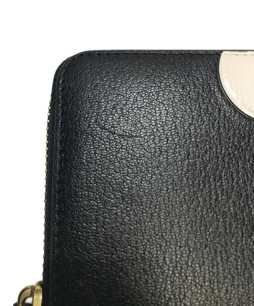 ANYA HINDMARCH（アニヤ・ハインドマーチ）ANYA HINDMARCH (アニヤ・ハインドマーチ) Large Zip Round Wallet Eyes in Capra ブラックの古着・服飾アイテム