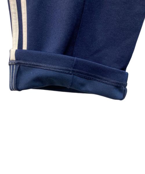 POP TRADING COMPANY（ポップトレーディングカンパニー）POP TRADING COMPANY (ポップトレーディングカンパニー) adidas originals (アディダスオリジナル) トラックパンツ ネイビー サイズ:Sの古着・服飾アイテム