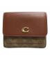 COACH（コーチ）の古着「ミラ スモール フラップ ウォレット」｜ブラウン