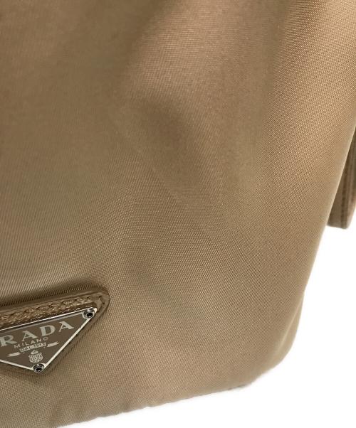 PRADA（プラダ）PRADA (プラダ) Re Nylon巾着ショルダーバッグ ベージュ CAMMEOの古着・服飾アイテム