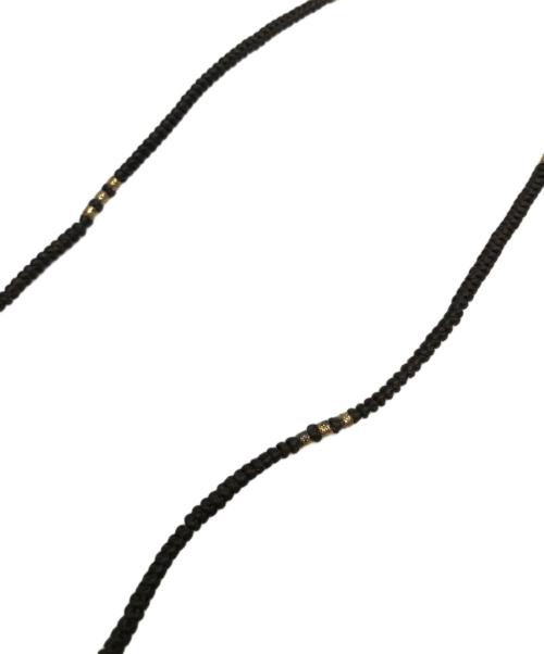 M.Cohen（エム・コーエン）M.Cohen (エム・コーエン) レザー×ボタンネックレス ブラック×ゴールドの古着・服飾アイテム