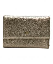 ANYA HINDMARCH（アニヤ・ハインドマーチ）の古着「ミニトライフォールドウォレット」｜シルバー