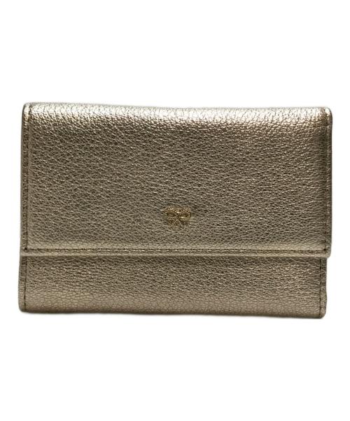 ANYA HINDMARCH（アニヤ・ハインドマーチ）ANYA HINDMARCH (アニヤ・ハインドマーチ) ミニトライフォールドウォレット シルバーの古着・服飾アイテム