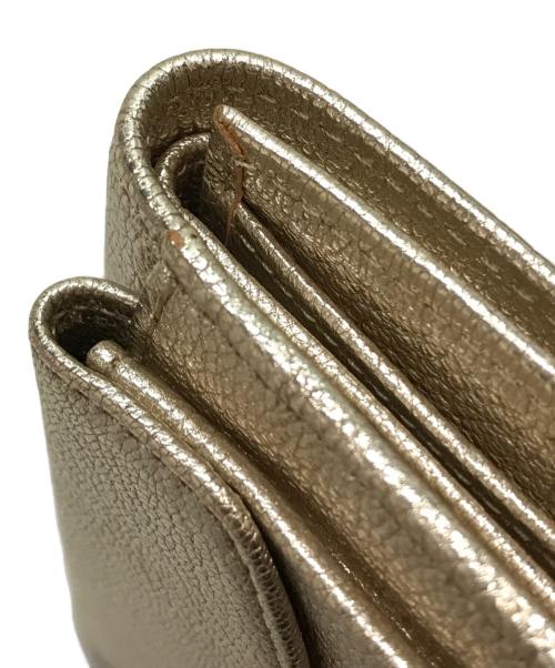 ANYA HINDMARCH（アニヤ・ハインドマーチ）ANYA HINDMARCH (アニヤ・ハインドマーチ) ミニトライフォールドウォレット シルバーの古着・服飾アイテム