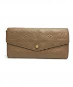 LOUIS VUITTONルイ ヴィトン）の古着「長財布」｜ブロンズ