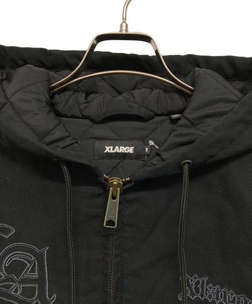 X-LARGE（エクストララージ）X-LARGE (エクストララージ) PATCHED OLD ENGLISH HOODED WORK JACKET ブラック サイズ:M 未使用品の古着・服飾アイテム