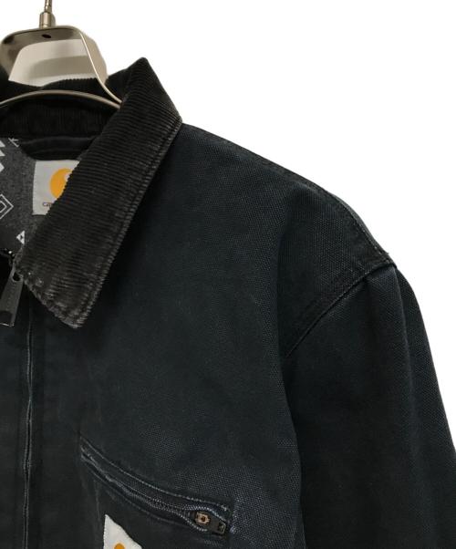 CarHartt（カーハート）CarHartt (カーハート) 裏地ネイティブ柄デトロイトジャケット DETROIT JACKET ネイビー サイズ:Lの古着・服飾アイテム