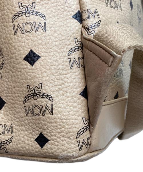 MCM（エムシーエム）MCM (エムシーエム) ビセトス ロゴグラム バックパック ベージュの古着・服飾アイテム