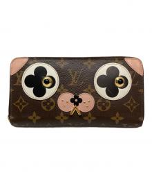 LOUIS VUITTON（ルイ ヴィトン）の古着「ドッグモチーフ ジッピーウォレット」｜ブラウン