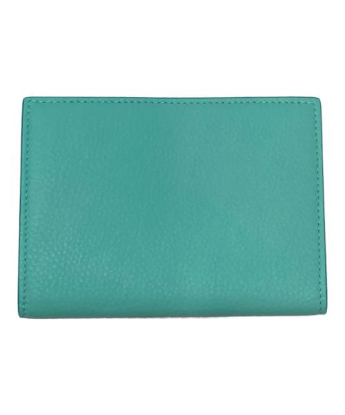 TIFFANY & Co.（ティファニー）Tiffany & Co. (ティファニー) パスポートカバー ターコイズブルー×ホワイトの古着・服飾アイテム