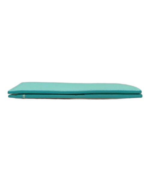 TIFFANY & Co.（ティファニー）Tiffany & Co. (ティファニー) パスポートカバー ターコイズブルー×ホワイトの古着・服飾アイテム