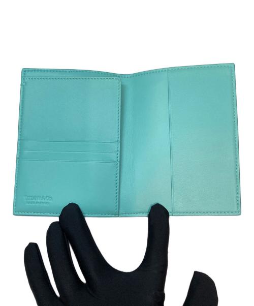 TIFFANY & Co.（ティファニー）Tiffany & Co. (ティファニー) パスポートカバー ターコイズブルー×ホワイトの古着・服飾アイテム