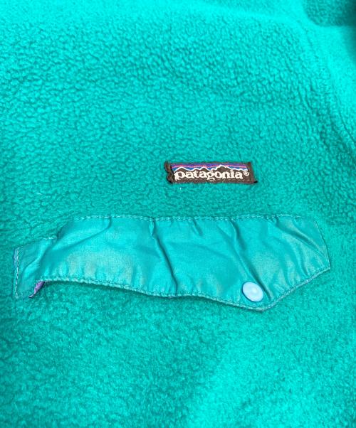 Patagonia（パタゴニア）Patagonia (パタゴニア) スナップT プルオーバー シンチラフリース エメラルドグリーン×パープル サイズ:Lの古着・服飾アイテム