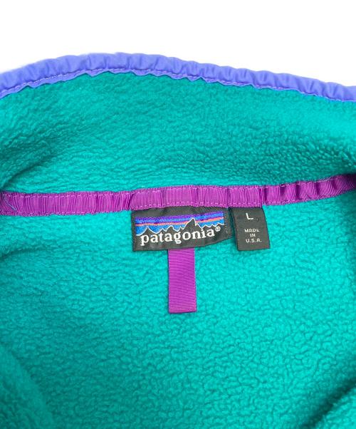 Patagonia（パタゴニア）Patagonia (パタゴニア) スナップT プルオーバー シンチラフリース エメラルドグリーン×パープル サイズ:Lの古着・服飾アイテム