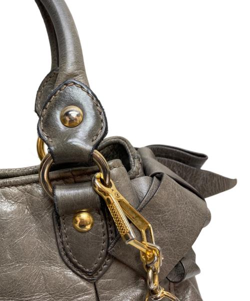 MIU MIU（ミュウミュウ）MIU MIU (ミュウミュウ) VITELLO LUX 2WAY リボンハンドバッグ グレーの古着・服飾アイテム