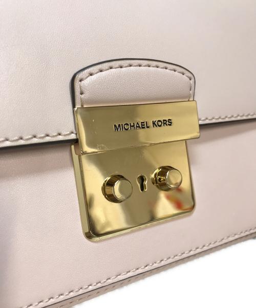 MICHAEL KORS（マイケルコース）MICHAEL KORS (マイケルコース) SLOAN WDITOR MD FLAP MESSENGER/スローン エディター ミディアム フラップ メッセンジャーバッグ ピンクの古着・服飾アイテム