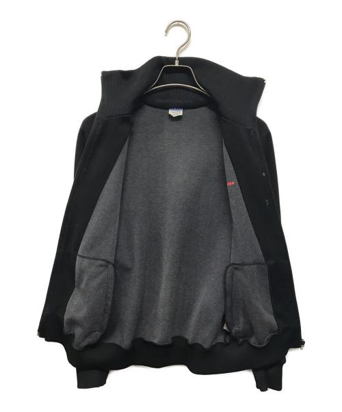 adidas（アディダス）adidas (アディダス) トラックジャケット　スタンドカラートラックジャケット　西ドイツ製 ブラック×レッド サイズ:Mの古着・服飾アイテム