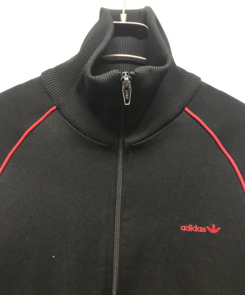 adidas（アディダス）adidas (アディダス) トラックジャケット　スタンドカラートラックジャケット　西ドイツ製 ブラック×レッド サイズ:Mの古着・服飾アイテム
