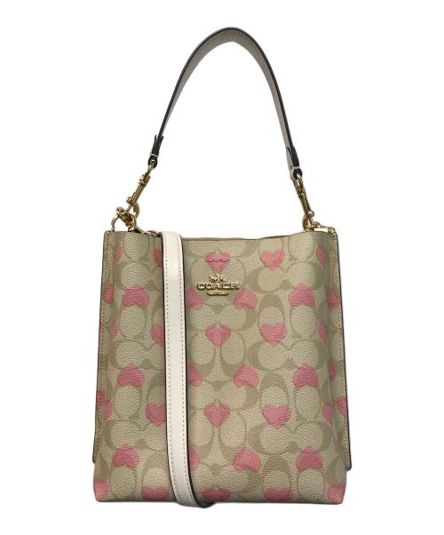 COACH（コーチ）COACH (コーチ) モリーバケットバッグ22 ベージュ×ピンクの古着・服飾アイテム