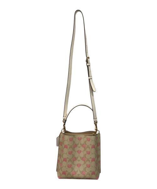 COACH（コーチ）COACH (コーチ) モリーバケットバッグ22 ベージュ×ピンクの古着・服飾アイテム