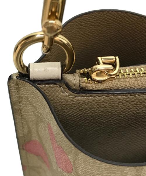 COACH（コーチ）COACH (コーチ) モリーバケットバッグ22 ベージュ×ピンクの古着・服飾アイテム