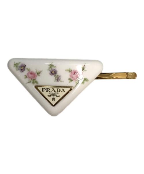 PRADA（プラダ）PRADA (プラダ) 三角ロゴ花柄ヘアバレッタ ホワイト×ゴールドの古着・服飾アイテム