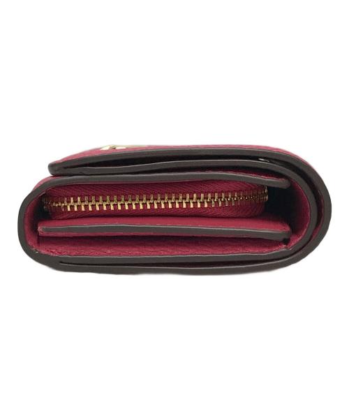 Kate Spade（ケイトスペード）Kate Spade (ケイトスペード) 2つ折り財布　ケイラ ピンクの古着・服飾アイテム
