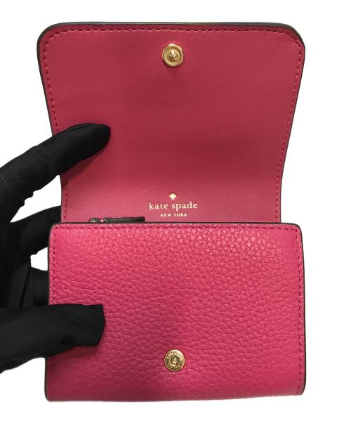 Kate Spade（ケイトスペード）Kate Spade (ケイトスペード) 2つ折り財布　ケイラ ピンクの古着・服飾アイテム
