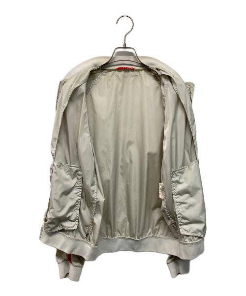 PRADA SPORTS（プラダスポーツ）PRADA SPORTS (プラダスポーツ) 00’Sナイロンジャケット　サイドロゴ ベージュ×レッド サイズ:Lの古着・服飾アイテム