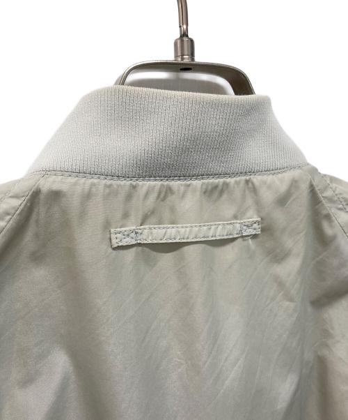 PRADA SPORTS（プラダスポーツ）PRADA SPORTS (プラダスポーツ) 00’Sナイロンジャケット　サイドロゴ ベージュ×レッド サイズ:Lの古着・服飾アイテム